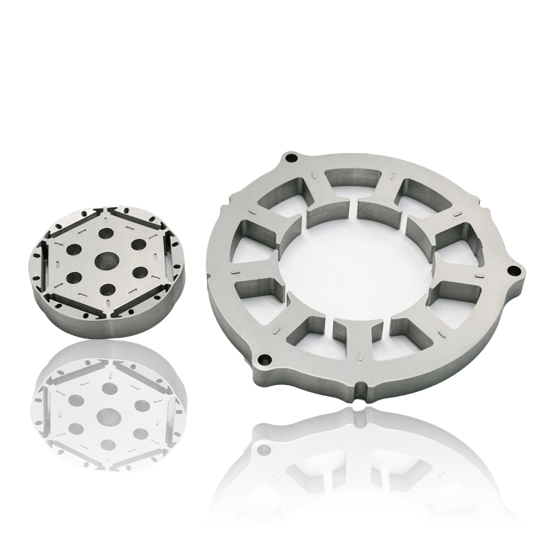 Hogyan befolyásolja az energiahatékonyságot, az örvényáram-veszteséget és a működési zajszintet a motor állórészmagjában lévő laminálás vastagsága és halmozási tényezője?